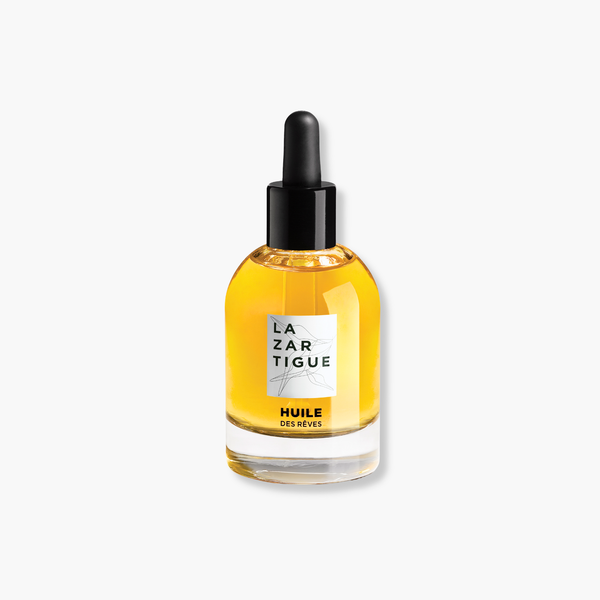 Lazartigue – Huile Des Rêves (Huile Sèche Nourrissante Cheveux), flacon en verre transparent avec pipette, rempli d'huile jaune, sur fond blanc